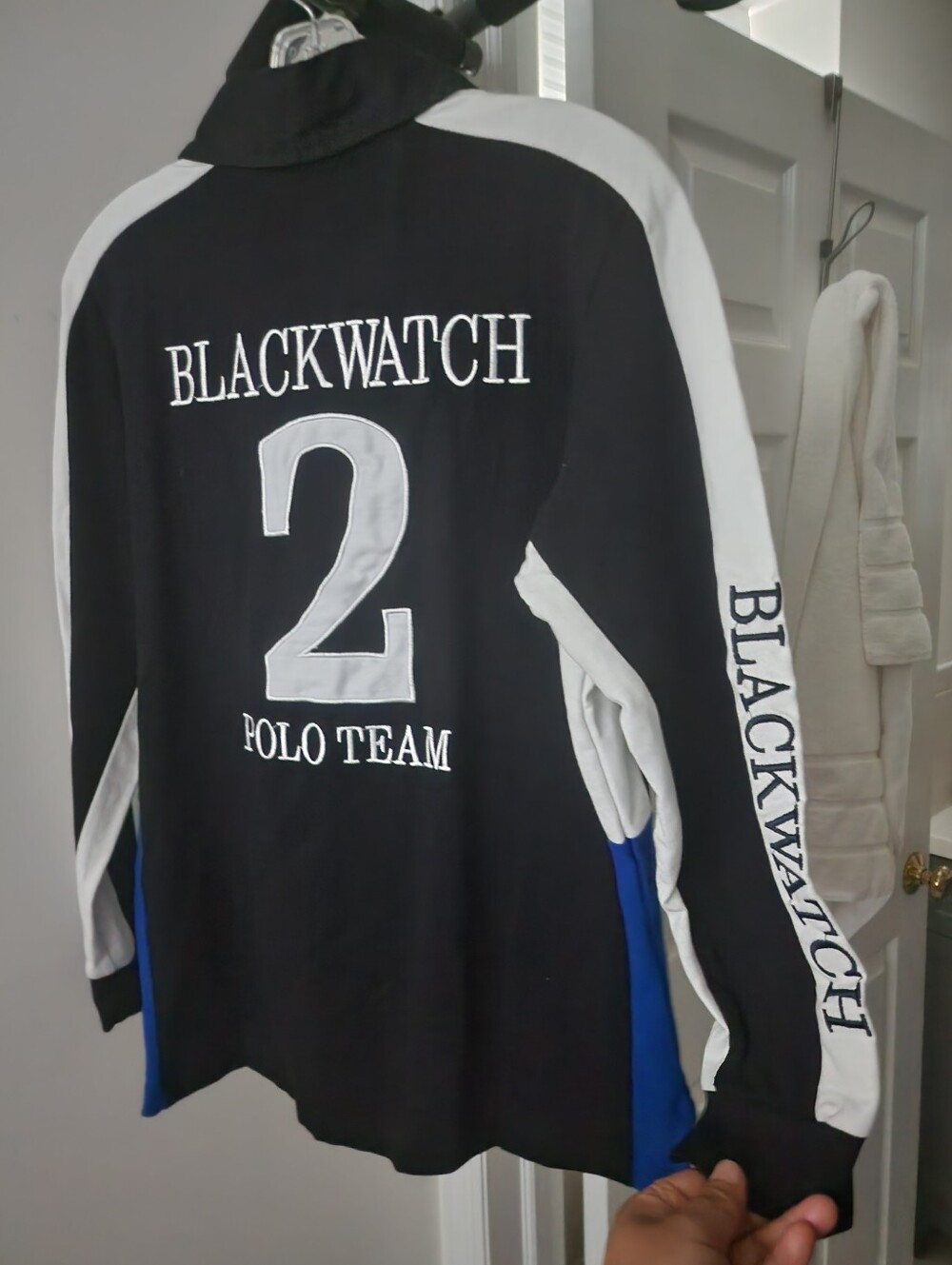 Black and Blue Long-Sleeve Light Polo with Gold Crest. XS-S